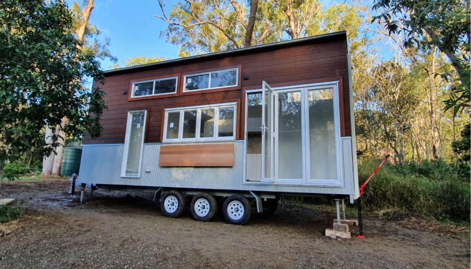 How can I connect power and water to a tiny home?